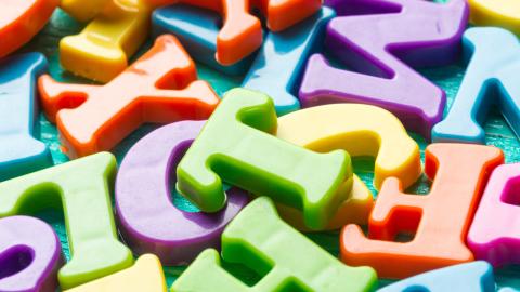 Jumble of magnetic kitchen letters