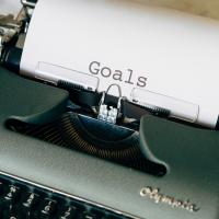 Typewriter showing the word Goals.