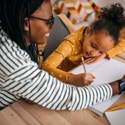 Mother and daughter doing homework