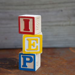 Stacked letter blocks that spell IEP